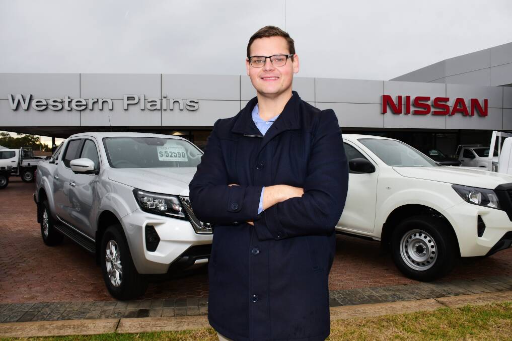 Career acceleration: Western Plains Automotive team member Adam Shuttleworth at work where he's excelled to become a certified sales manager with Nissan at the age of 21. Photo: BELINDA SOOLE