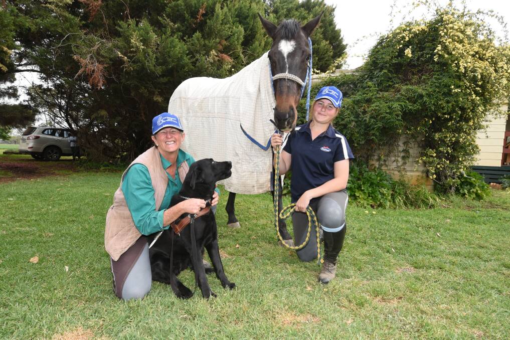 FUNDRAISER: Sue-Ellen Lovett, guide dog Amarni, former racehorse Spillsbury and Sarah Forgione are ready for The Challenge--Ride Against Cancer. Photo: BELINDA SOOLE