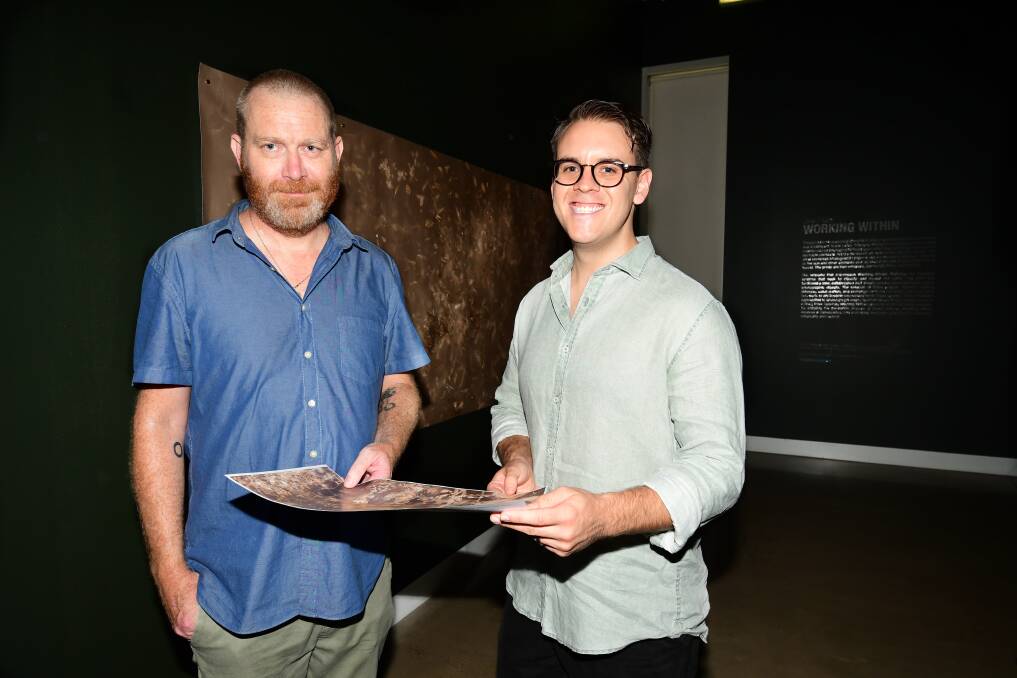 Intriguing: Western Plains Cultural Centre curator Kent Buchanan with artist James Farley at the exhibition opening at the weekend.