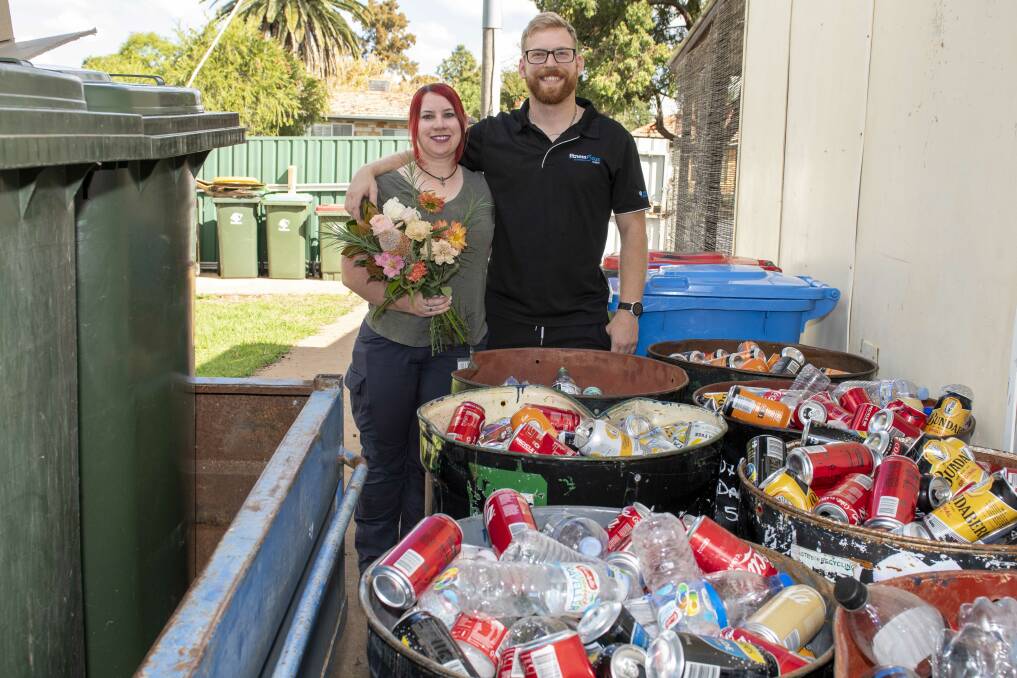 CLEVER THINKING: Pagan Hockley and her fiancé Andie Lickiss have been collecting cans and bottles to save for their wedding. Picture: BELINDA SOOLE 