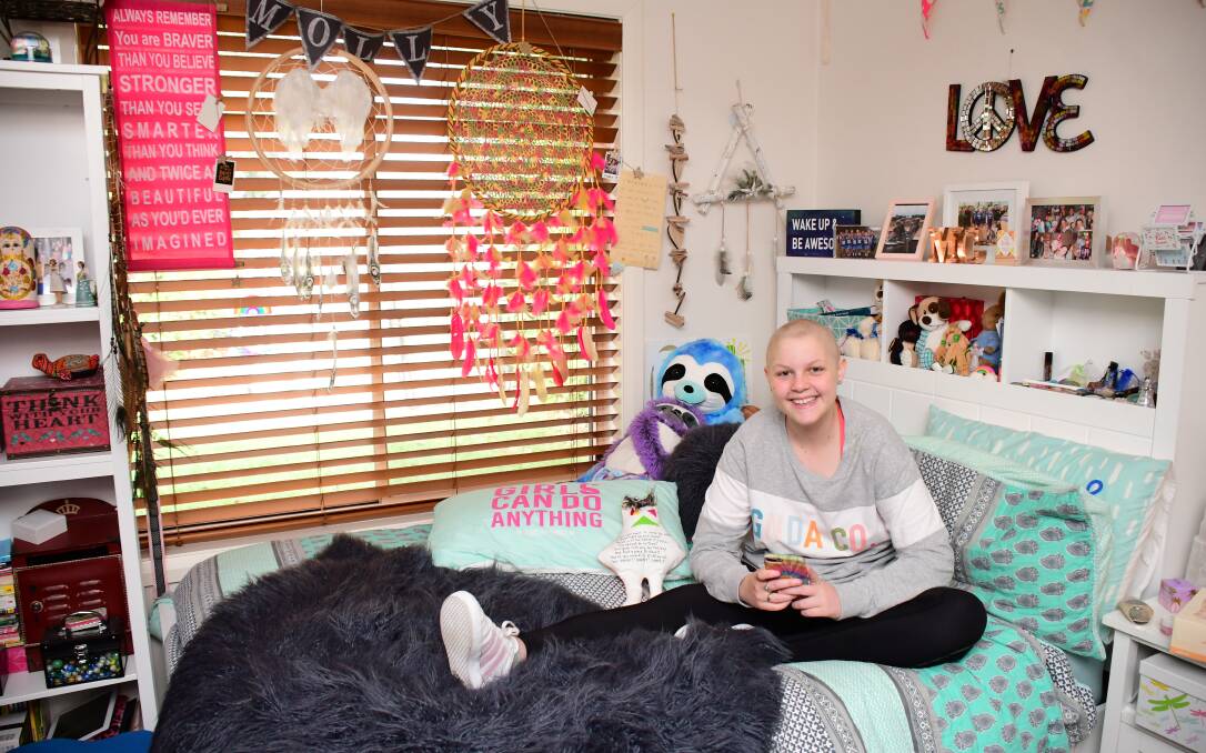 HOME AGAIN: After 10 months away, Molly Croft says the best thing about being back in Dubbo is her own bed and the delicious food, like fried rice and pies. Photo: BELINDA SOOLE