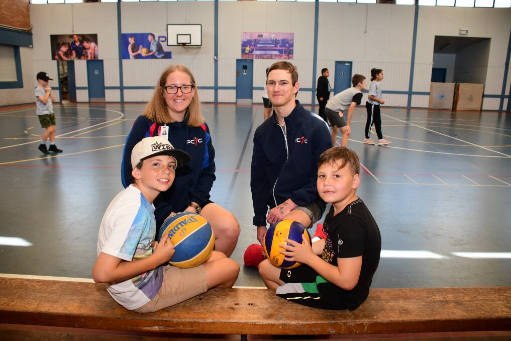 HOLIDAY FUN: Dubbo PCYC manager Emily Ross with Connor Miller, Charlie Mayall and Alan King. Photo: BELINDA SOOLE. 