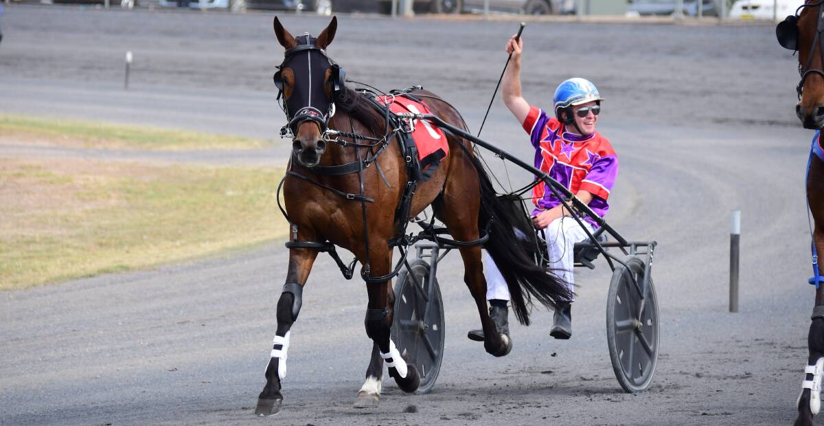 Reason to Cheer: Dubbo driver Tom Pay celebrates another win for Gemma and Mat Rue on Sunday. Photo: Belinda Soole. 