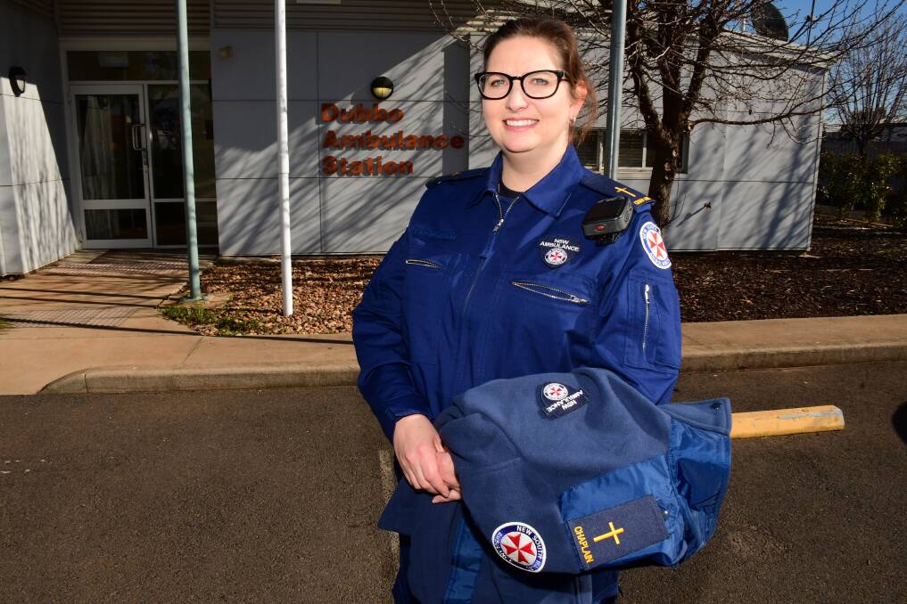 Calling: NSW Ambulance chaplain, Misty Carter decked out in her new uniform, takes up a role she considers to be an honour at the Dubbo station. Photo: BELINDA SOOLE