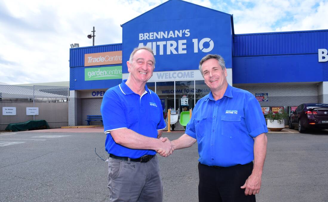 Passing the baton: Petrie's Mitre 10 director Michael Fergus and Brennan's Mitre 10 managing director Michael Brennan ahead of the Dubbo Mitre 10's change of ownership on March 30. Photo: BELINDA SOOLE