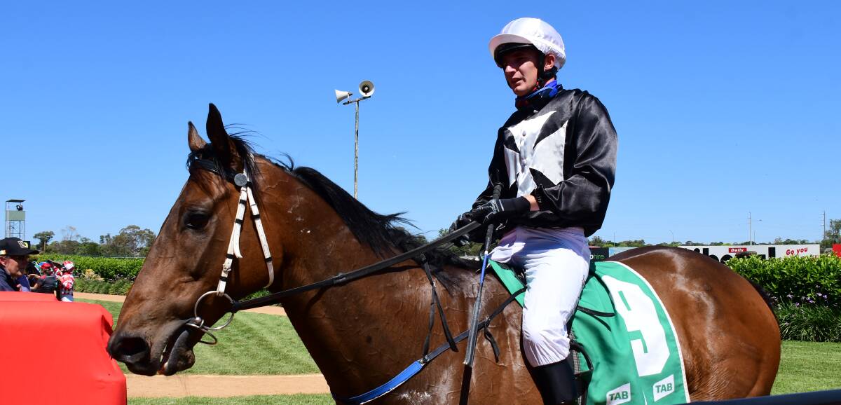 DOUBLE TROUBLE: Clayton Gallagher, sitting astride Drummed Out, won twice in Dubbo on Tuesday. PHOTO: BELINDA SOOLE.
