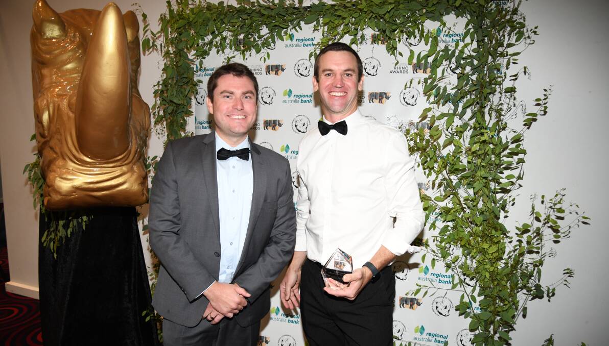Success: IEC Advisory directors Joel Bones and Tom Larkin with the trophy for the Summit Cranes Award for Excellence in Small Business. Picture: AMY MCINTYRE 