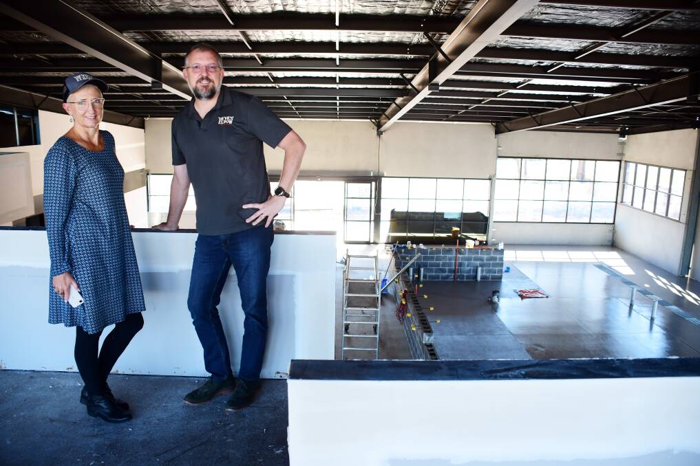 Full steam ahead: Devil's Elbow Brewery co-founders Melissa Knaggs and Brendon O'Sullivan inside the new venue that is rapidly taking shape in Blueridge Business Park. Photo: BELINDA SOOLE