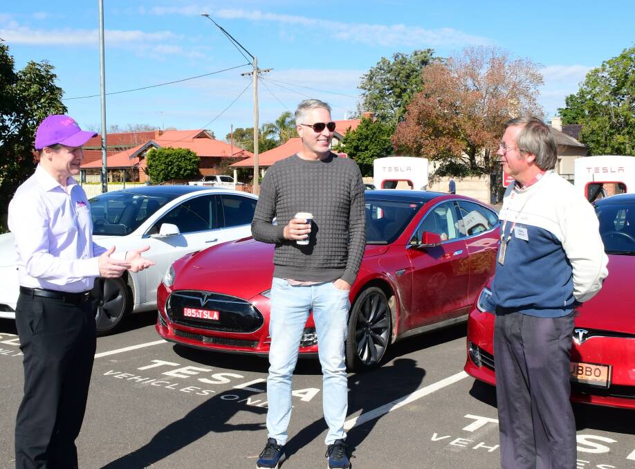HAVING A CHAT: Matthew Dickerson, Dean Hattingh and Chris Dalitz from the Dubbo Electric Vehicle Interest, Owners, Users and Supporters group welcome all attendees. Photo: BELINDA SOOLE