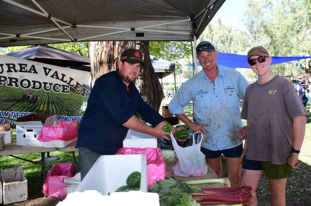 SOLD OUT: Local producer Troy Bourke with Trevor and Doug Willis at the most recent Dubbo Farmer's Market. PHOTO: BELINDA SOOLE.