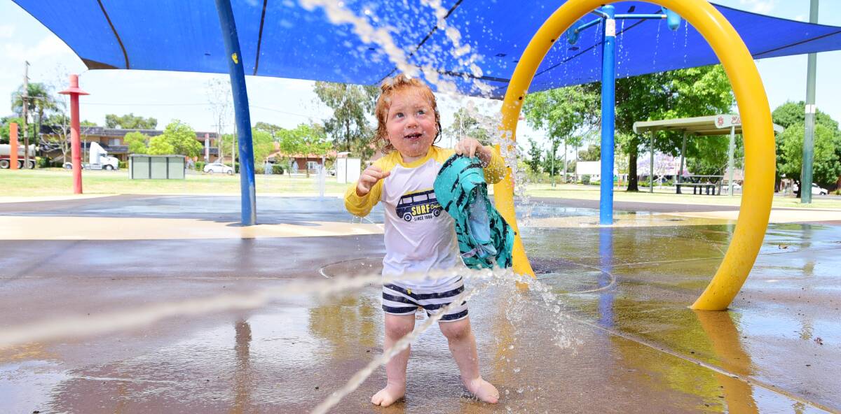 SCORCHING START TO SUMMER: 19 month-old Obie Johnson, from Bathurst, cools off at Elston Park. Photo: BELINDA SOOLE