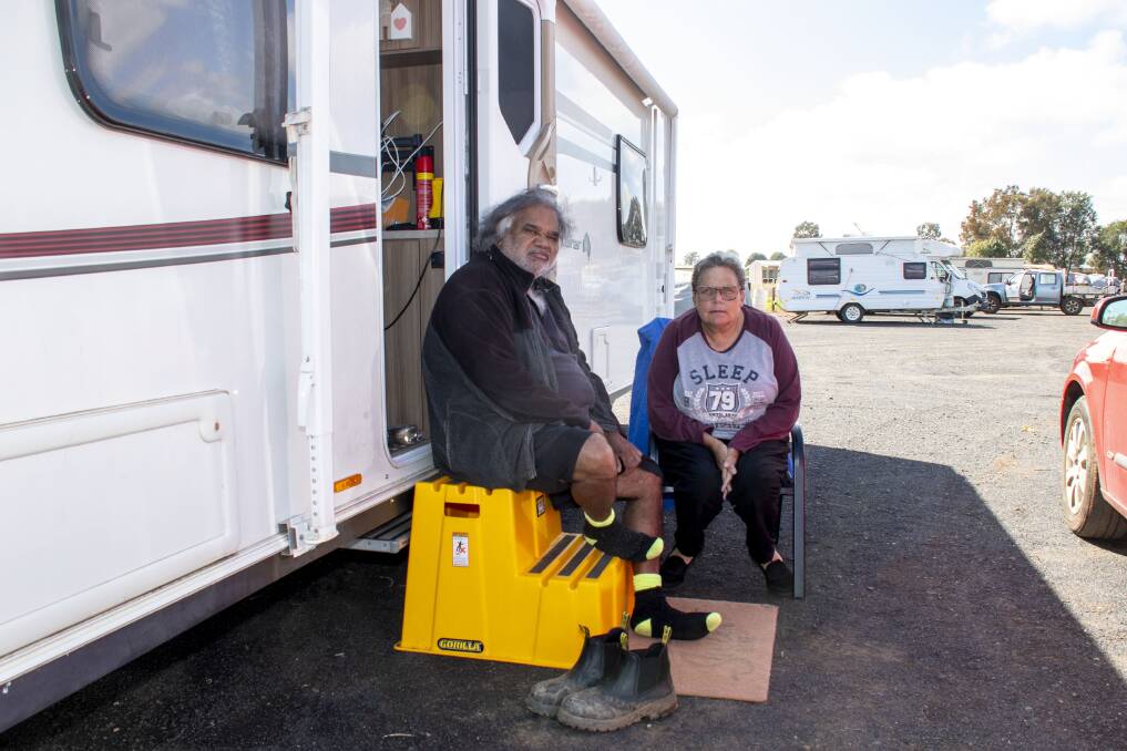 Ken clark and Vicky Morgan were woken up at 1am on Sunday to be relocated at Dubbo showground as flood inundate the Western Plains Caravan Park on Bultje Street. Picture by Belinda Soole