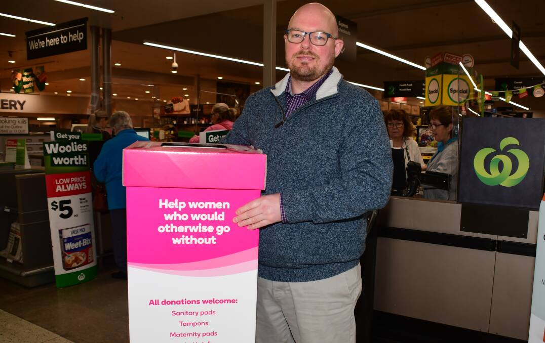WOMEN HELPING WOMEN: Orana Mall Woolworths store manager Ben Richard is urging you to help 'Share the Dignity'. Photo: BELINDA SOOLE. 