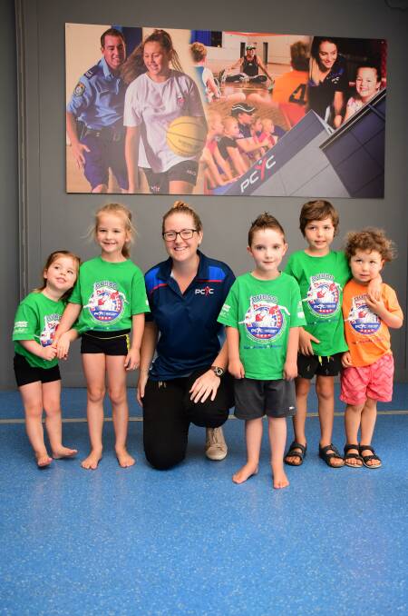 FUN WITH PCYC: Holly and Chloe Turner with club manager Emily Ross, Xander Maiden and Jackson and Luca Coheo. Photo: BELINDA SOOLE. 