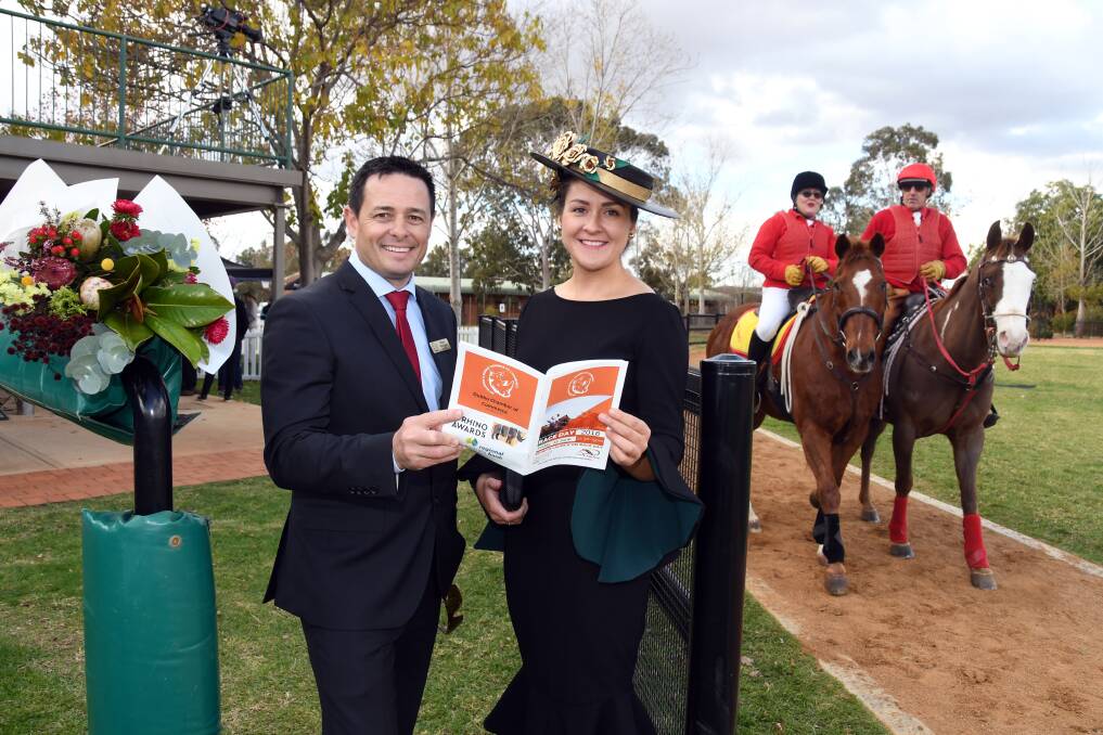AWARD ENTRIES OPEN: Chamber president Matt Wright and Fashions on the Field winner Emma Burge at Friday's Dubbo Chamber of Commerce Race Day. Photo: BELINDA SOOLE