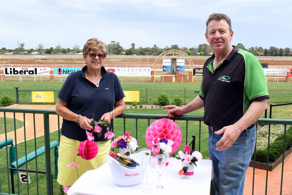 A big day ahead: Ronnie Lew and Vince Gordon prepare for Melbourne Cup day at the Dubbo Turf Club. Photo: BELINDA SOOLE.