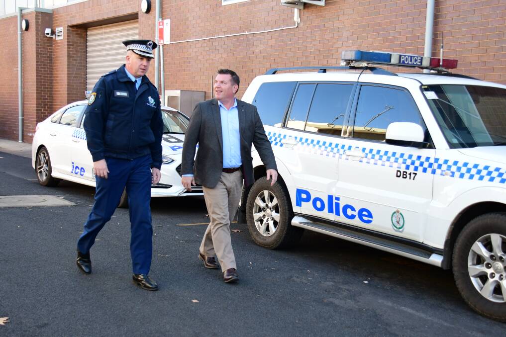 Welcome resources: Orana Mid-Western Police District commander Superintendent Peter McKenna and Dubbo MP Dugald Saunders discuss the impact of having extra officers on the frontline. Photo: BELINDA SOOLE