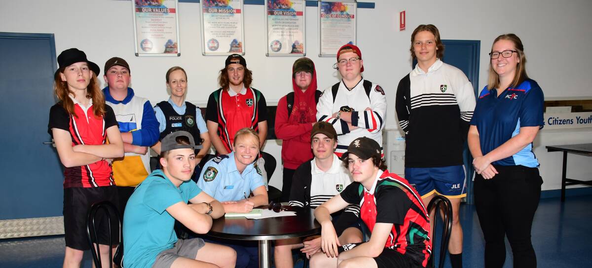 Snr Const Melanie Maher Youth Liason Officer, Emily Ross PCYC Manager and Snr Const Sally Treacey with graduating Year 10 Students from Dubbo College South campus. Photo: BELINDA SOOLE