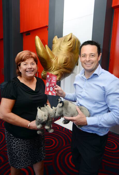 Gold moments: Dubbo Chamber of Commerce executive officer Toni Beatty and president Matt Wright put the finishing touches to the 2017 Rhino Awards venue. Photo: BELINDA SOOLE