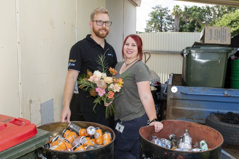 GOOD IDEA: Pagan Hockley and Andie Lickiss have been collecting cans and bottles to save for their wedding. Picture: BELINDA SOOLE 