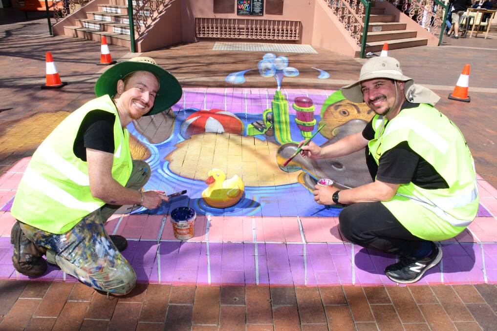 FIRST MURAL COMPLETED: Artists Zac Craig and Anton Pulvirenti at the Rotunda. Photo: BELINDA SOOLE. 