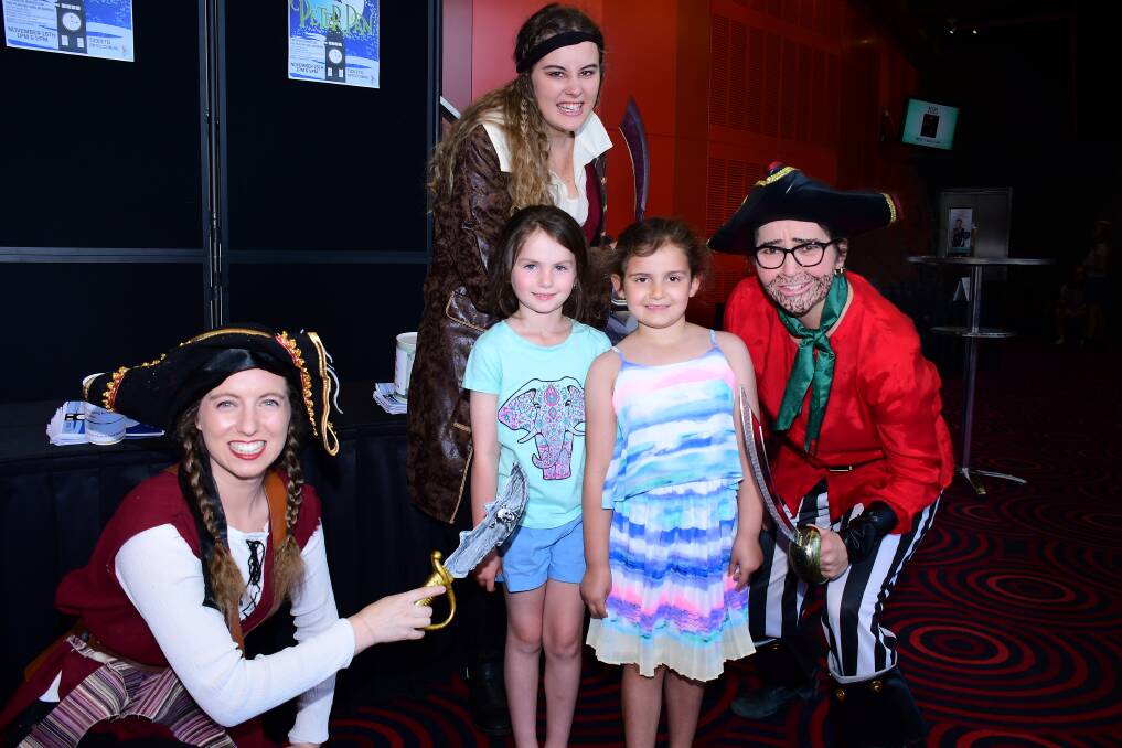 Pirates Jessica Haldon, Jacinta Houghton and Nicky Wonderley with Rori Naden and Arli Stewart before the performance of Peter Pan. 