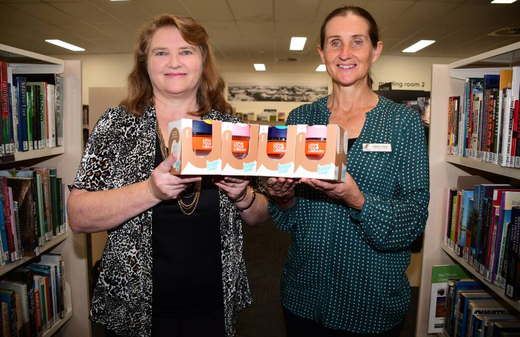 CELEBRATION: Macquarie Regional Library's Anne Barwick and Melissa Tong encouraging residents to enter the competition. Photo: BELINDA SOOLE