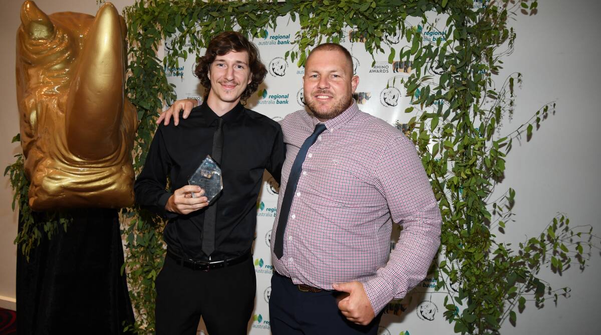 Hard work pays off: Apprentice of the Year Brandon Bennett of Dubbo Tree Service and his boss, Mitch Hodder. Picture: AMY MCINTYRE