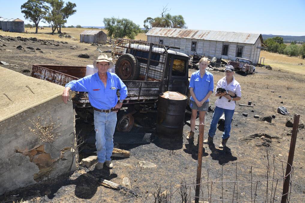 FIRE: Jamie Milling and daughters Fenella and Annabel are fortunate after the Sir Ivan Fire. Photo: BELINDA SOOLE 