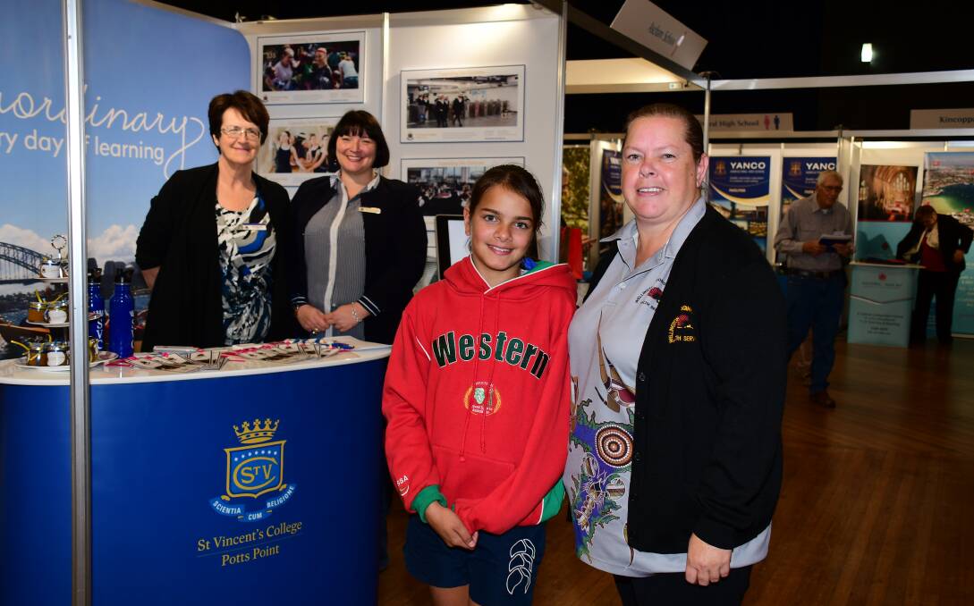 Education:St Vincent's Principal Anne Fry, director of boarding Maryanne O'Donoghue with Ebony and Cherie Colliss. Photo: Amy McIntyre.