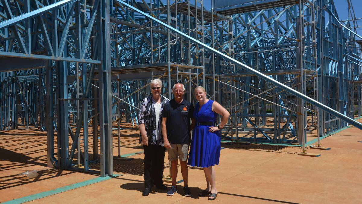 Griffith University researchers Professor Anneke Fitzgerald and Dr Katrina Radford, with Maranatha Vice Chairman Terry Frost (middle) inspect the centre's construction. Photo: Taylor Jurd