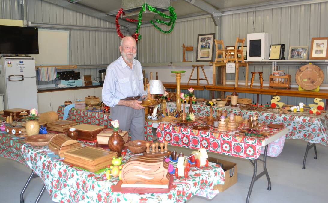 Gifts galore: Dubbo Woodturning and Woodcraft Club member Duncan Fabian with a huge range of hand-made items that are ready to be sold at the Club's store, just in time for Christmas. Photo: Taylor Jurd