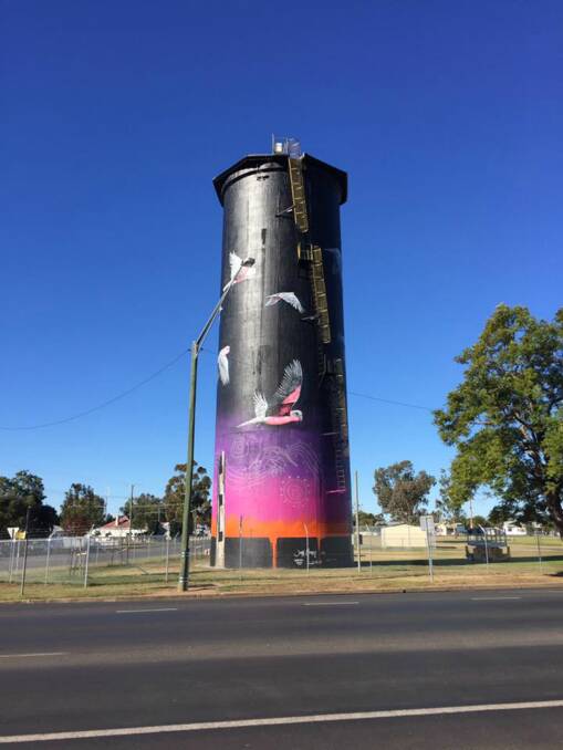Epic: Coonamble's 26-metre tall water tank has been transformed into a stunning mural. Photo: John Murray Art Facebook 