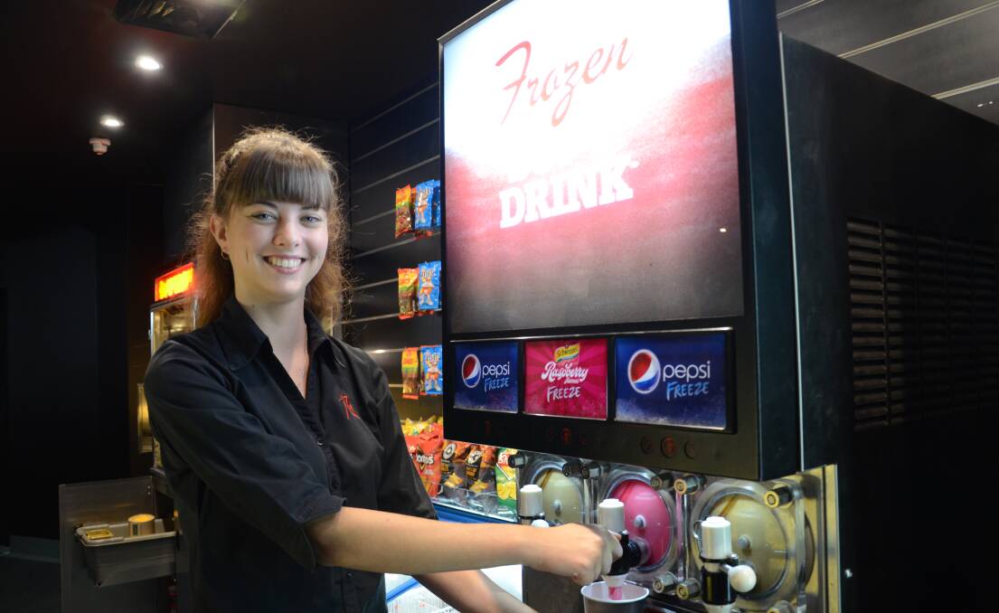 Molly Minehan pours another frozen drink at Reading Cinemas Dubbo.
Photo: JENNIFER HOAR 