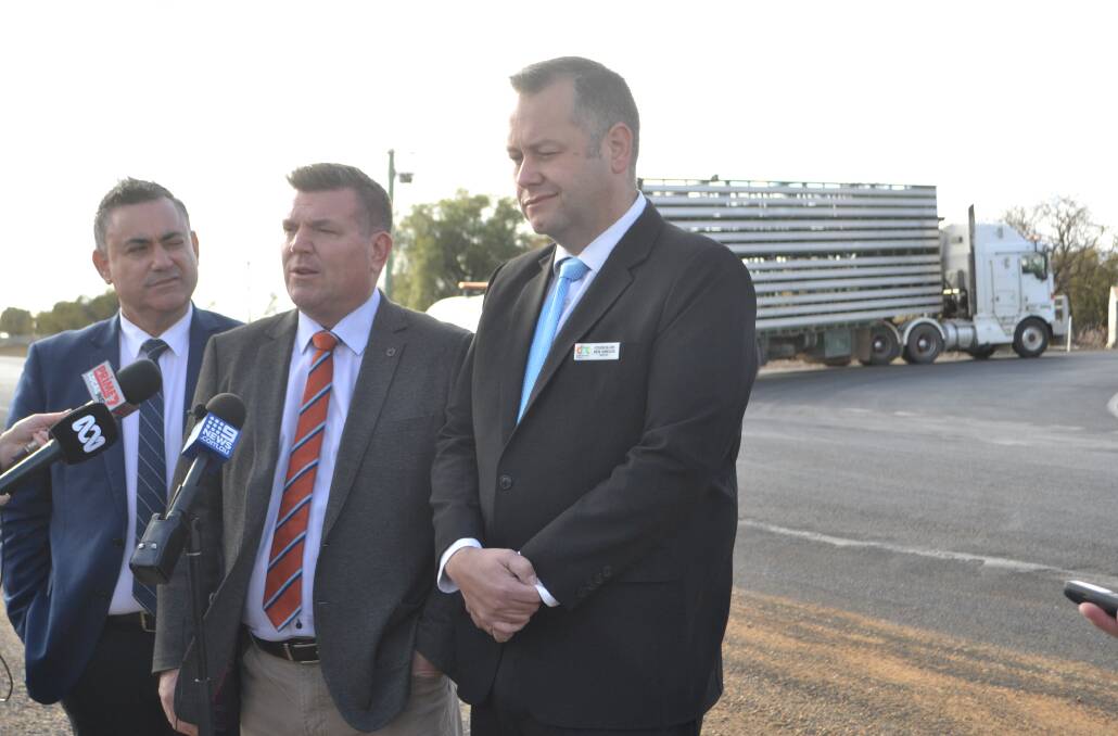 Deputy Premier and Minister for Regional NSW John Barilaro, Dubbo MP Dugald Saunders and Dubbo Regional Council Mayor Ben Shields outside the saleyards intersection. Photo: Taylor Jurd.