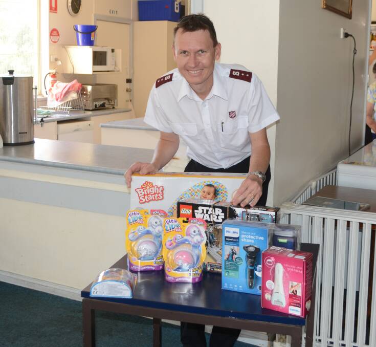 Helping others: Orana Corps Salvation Army officer Captain David Sutcliffe with donated items. Photo: Taylor Jurd. 