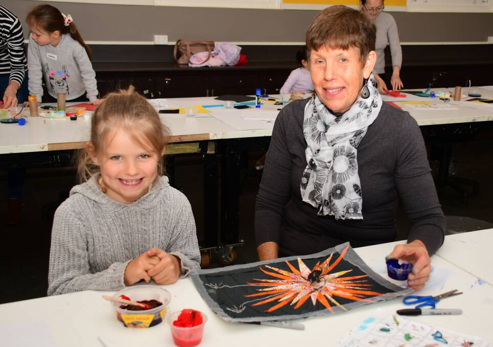 School holidays: Emily Lucan with WPCC workshop tutor Michelle McKay at one of the sessions last week. Photo: Belinda Soole