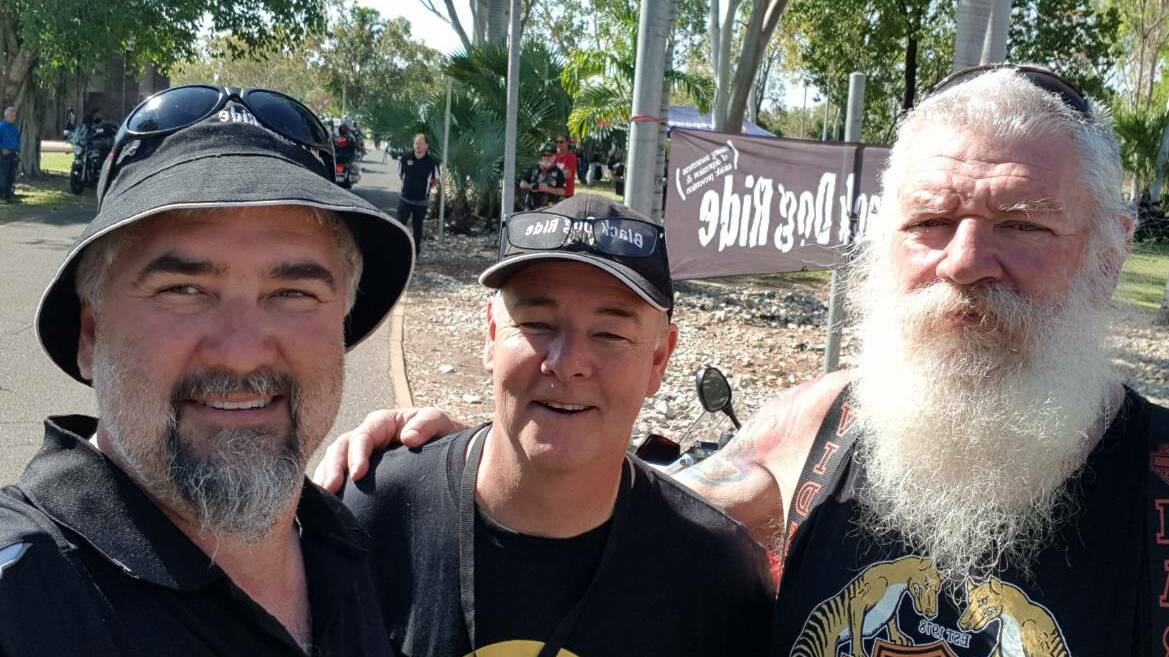 Wayne Amor, Black Dog Ride CEO, with David Peach, and Graham 'Bear' Falconer from Wagga Wagga - at Katherine muster point. Photo: Supplied. 