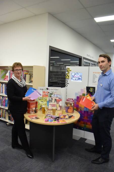 Interactive: Dubbo Macquarie Regional Library's manager of Library Services and Collections Lindy Allan with branch manager Peter Irwin. Photo: Taylor Jurd