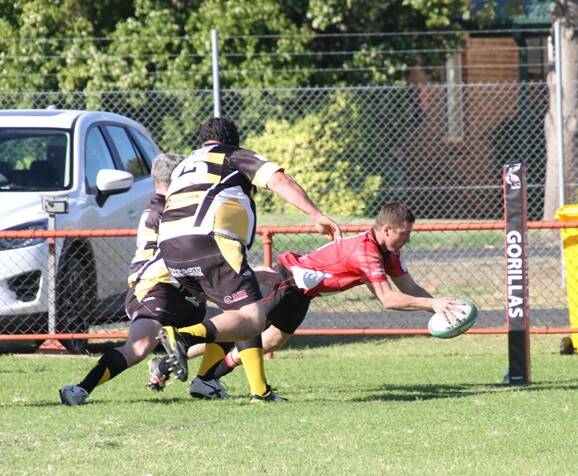 Narromine Gorilla's player John O'Meara scores a try in round two against the Dubbo Rhinos. Photo: Cassey Tresseder Photography