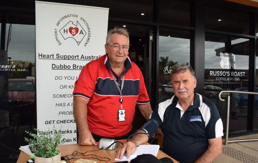 Health and wellness: Heart Support Australia Dubbo branch Allan Warwick with Robert Herbert outside of Russo's Coffee Bar during Heart Week last week. Photo: Taylor Jurd.