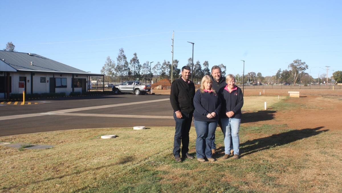 Martin Simmons, Dubbo Stock and Station Agents director; charity ball committee
members Libby Kelly and Patsi OBrien, and Rod Crowfoot, Macquarie Homestay at the Macquarie Homestay facility in Dubbo. The area to the right is where the second stage of the project is planned to be built. Photo: Supplied.