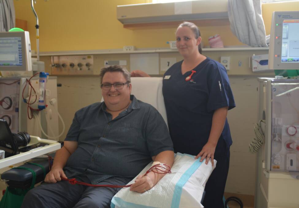 Take the test: Dubbo's Dean McDonald receives dialysis for his kidneys three days a week. He is pictured here with Dubbo Base Hospital registered nurse Jacqui Dorby. Photo: Taylor Jurd