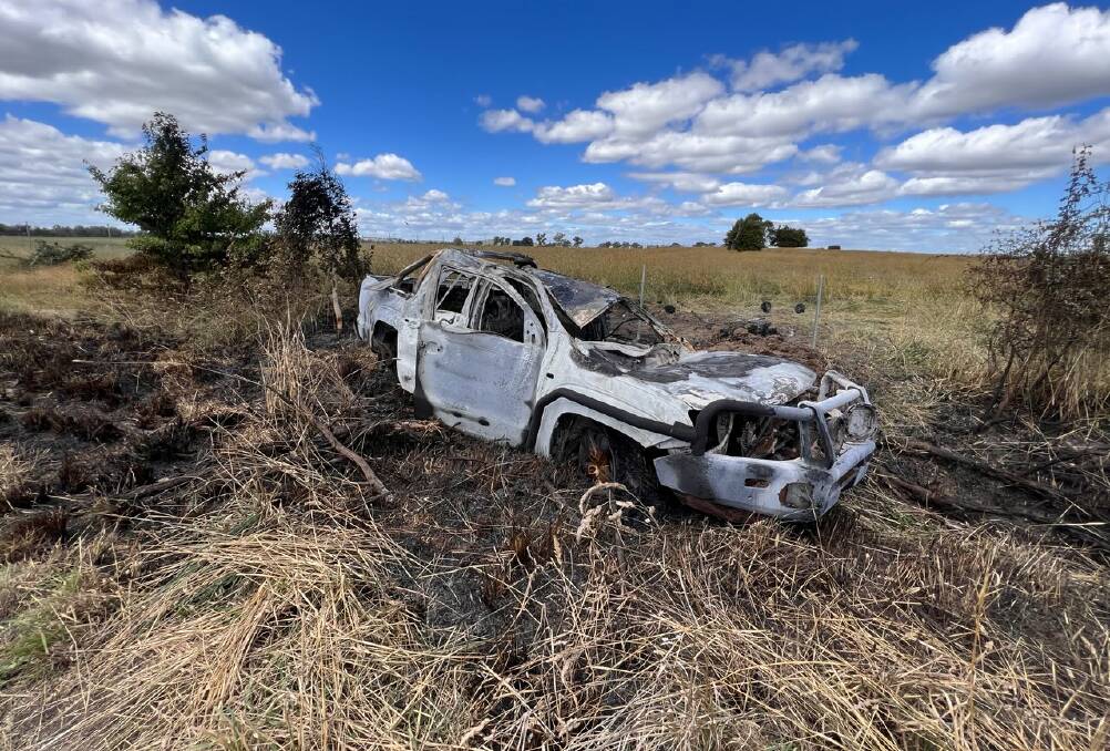 UNRECOGNISABLE: The burnt out wreckage of the ute. 