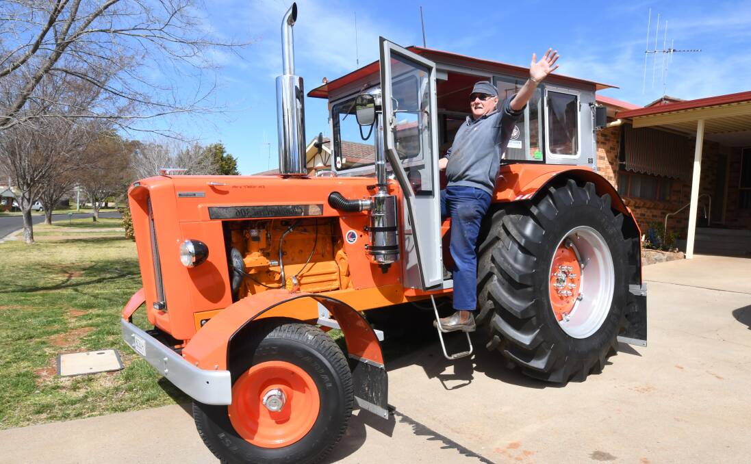 OFF WE GO: Tractor trek participant Graham Press with his 52-year-old Chamberlain 306 tractor. Photo: JUDE KEOGH