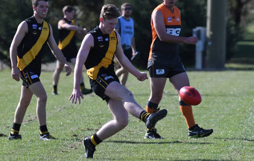 STANDING UP: Tigers younger Pete Byrne, fresh off a best-on-ground performance in the under-17s grand final last weekend, was brilliant for the Tigers on Saturday. Photo: JUDE KEOGH