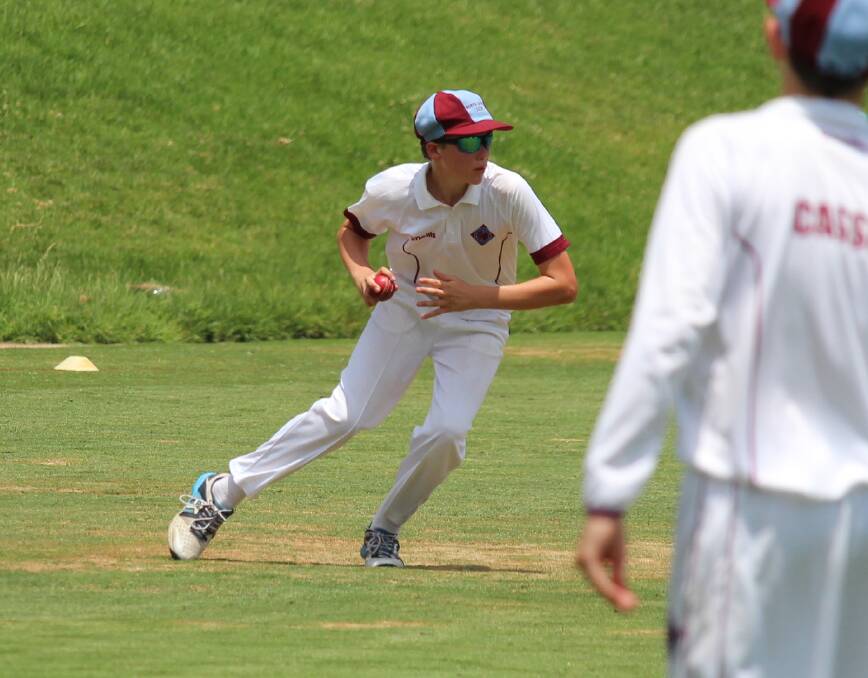 NONE ON THE ARM: Max Di Veroli looks to peg one in at the stumps from the boundary at Kinross for North Shore. Photo: MAX STAINKAMPH