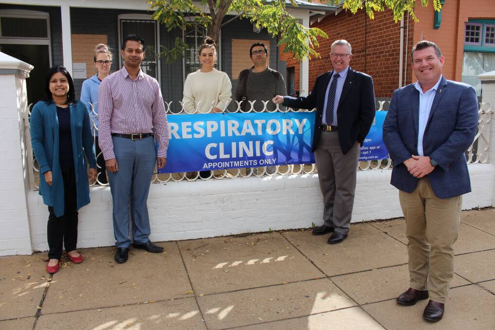 GP-LED COVID-19 CLINIC: The clinic's doctors and nurses including lead clinician Dr Sunil Jacob (second from left, front) meet with Parkes MP Mark Coulton (second from right) and Dubbo MP Dugald Saunders (right) on Friday. Photo: Contributed.