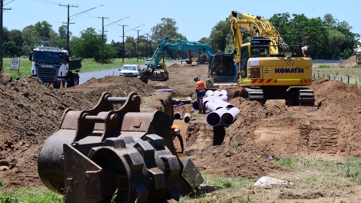 PIPELINE: Jonishan installs Dubbo's cross-city and non-potable water pipeline on the corner of Brisbane and Myall streets. It will be heading south along Brisbane Street "in coming days". Photo: BELINDA SOOLE.