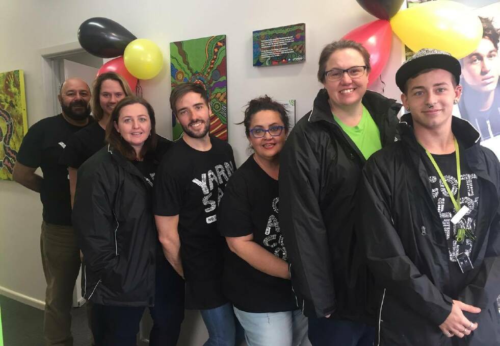 HERE TO HELP: Kevin Saul, Christina Rogers, Catherine Robinson, Paul Rich, Rachel Thomas, Ann-Maree Hartley and Nic Steepe at the unveiling of the artwork and plaque at headspace Dubbo in Church Street. Photo: contributed    